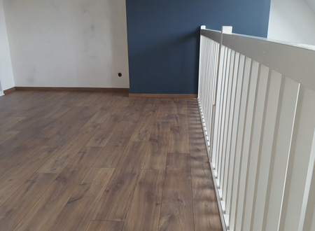 Photo de la rénovation d'une maison avec parquet